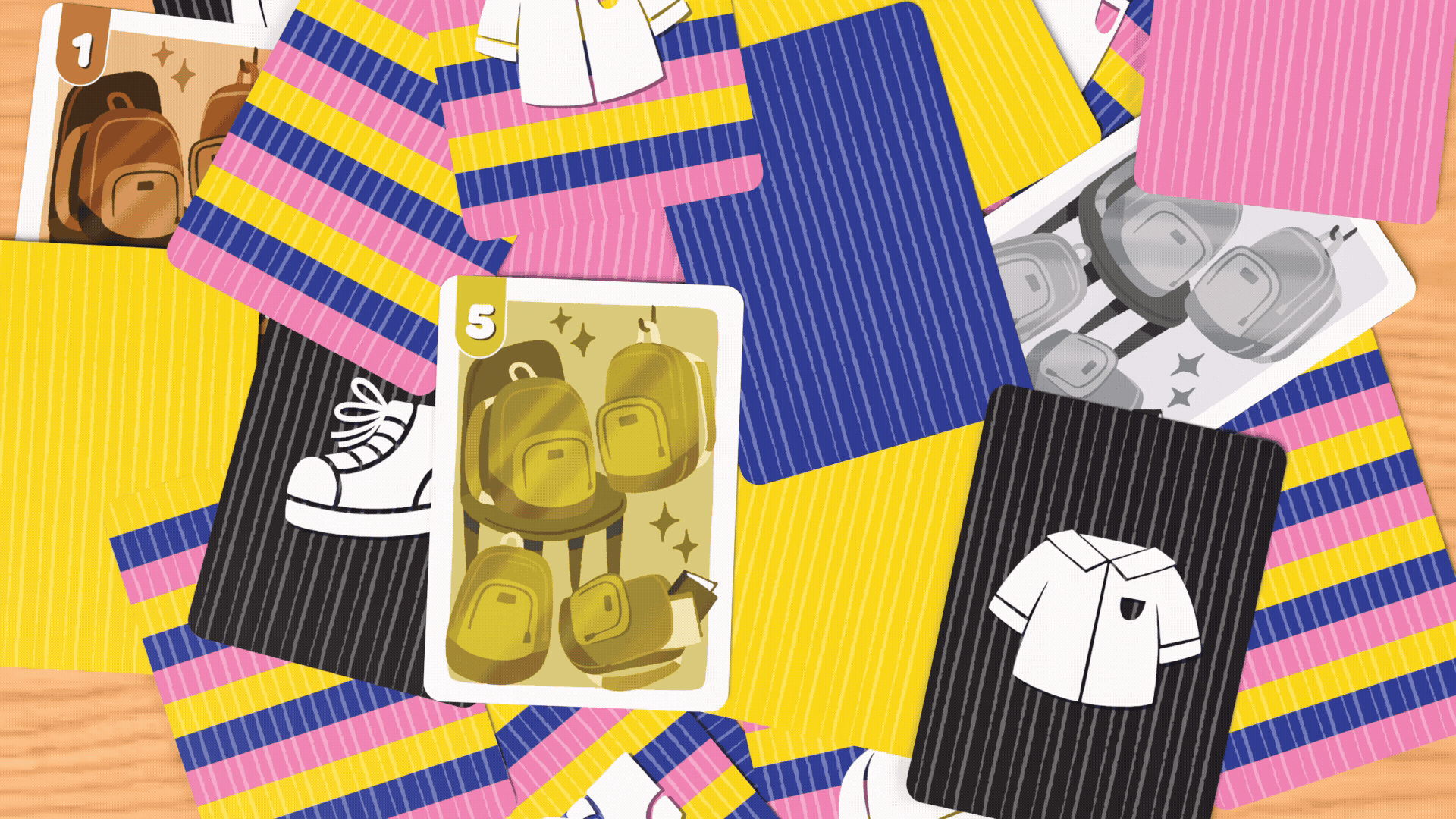 The golden Backpack card animating on a wood table